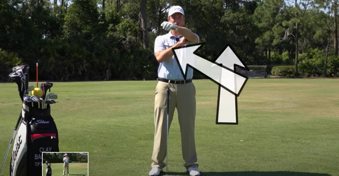 On the backswing your left arm rolls up and over your right shoulder